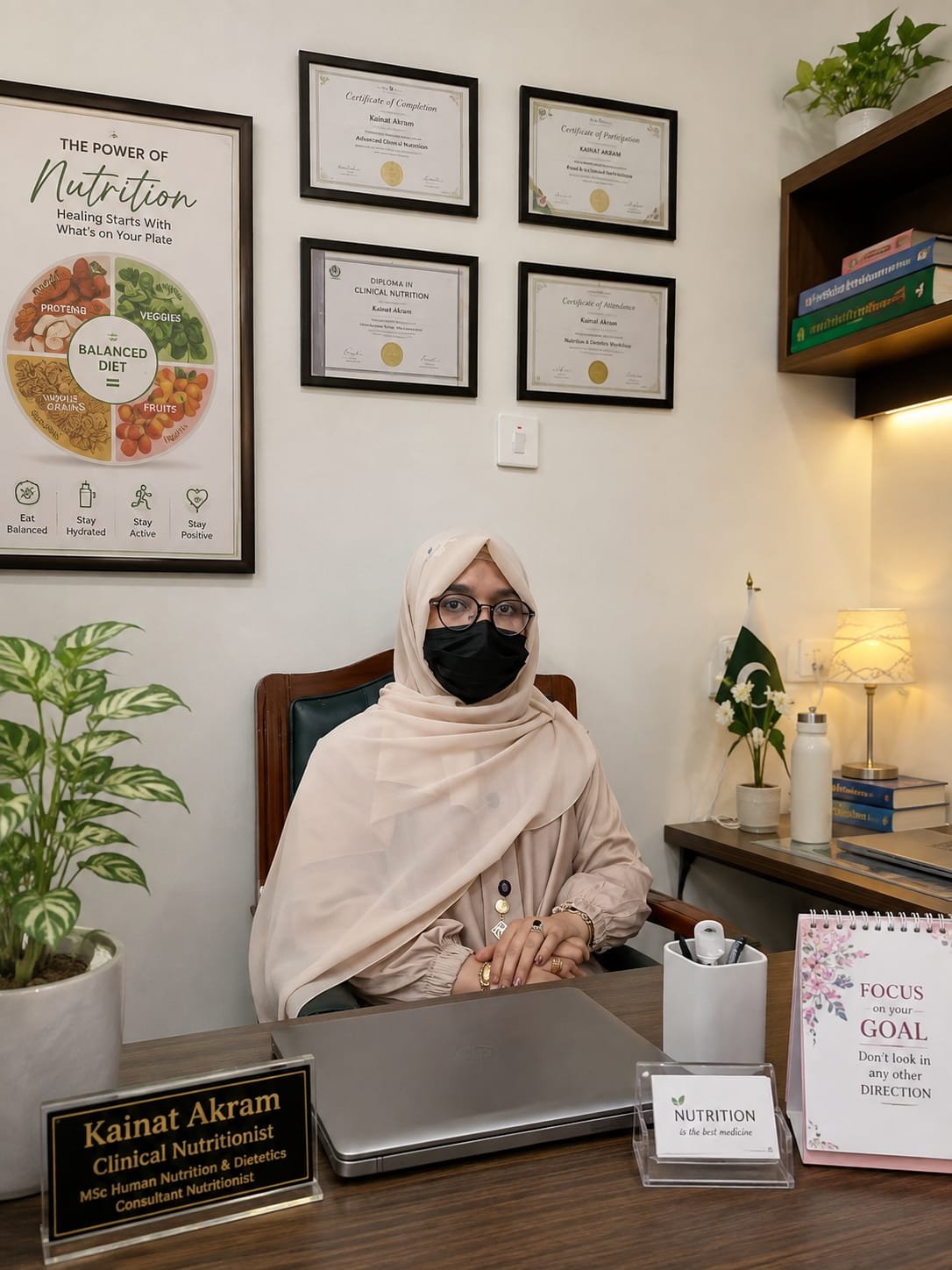 DN Kainat Akram at her clinic desk